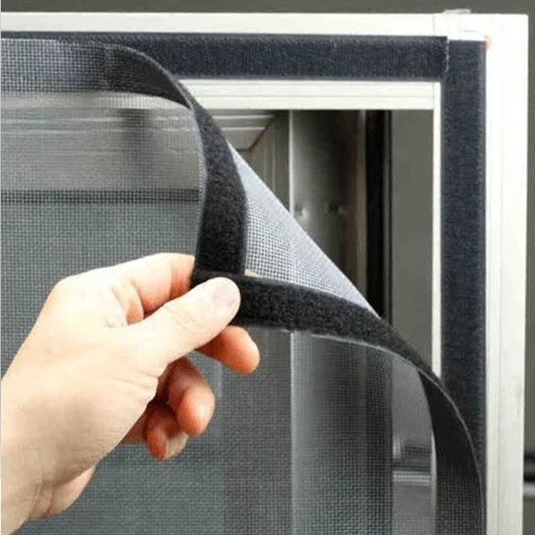 Pleated mosquito net on a sliding door